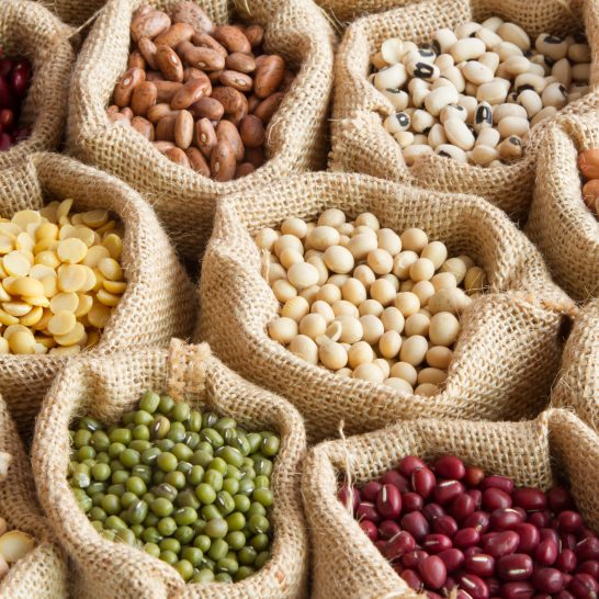 various of legumes in sack bag. organic food and creation of natural product concept.